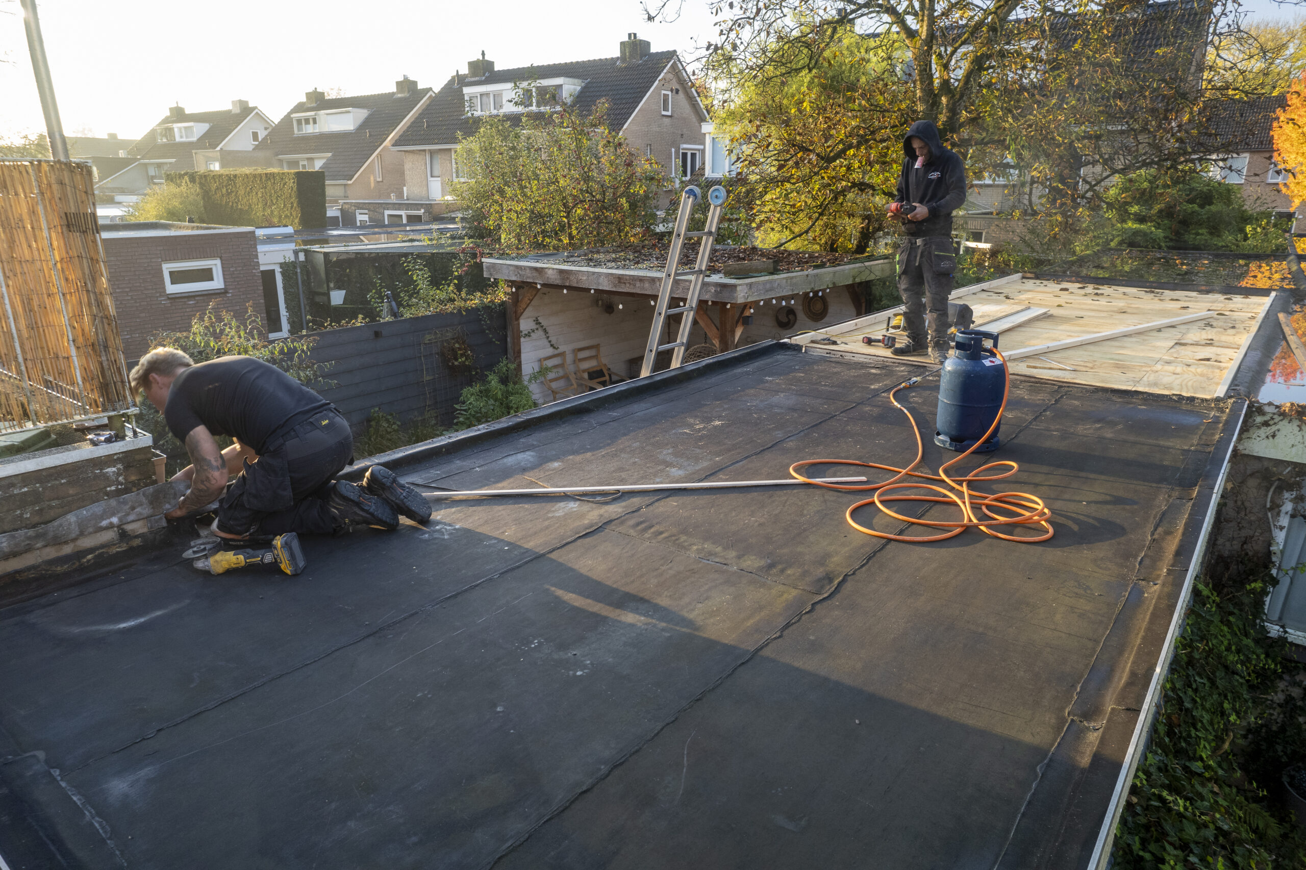 Plat dak renoveren